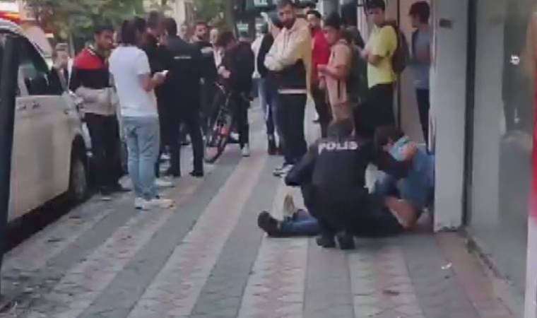 Sokakta yürüyen kadının fotoğrafını çeken erkeğe meydan dayağı!