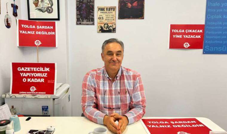 Tahliye edilen Tolga Şardan masasının başında: ‘Gazeteciliğe devam’