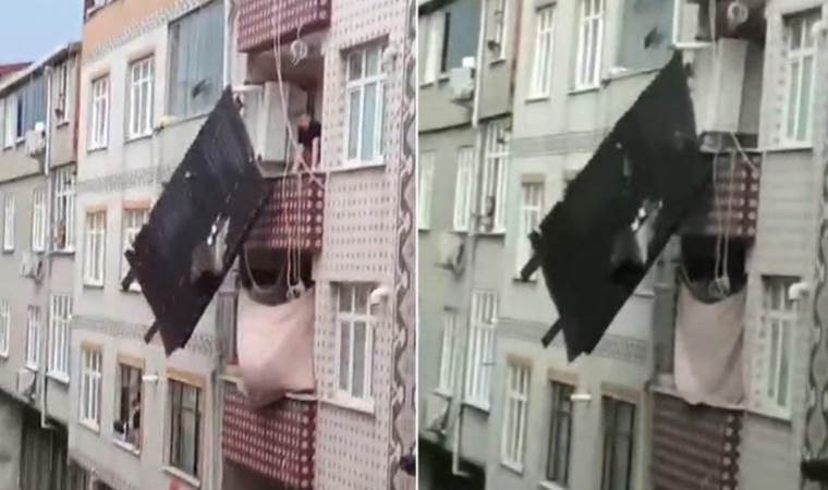 Çatıdan parça koptu… Çamaşır ipinde asılı kaldı
