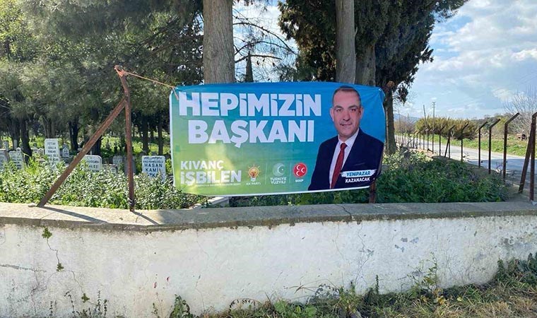 AKP’li başkan adayı mezarlığa ‘Hepimizin Başkanı’ diye afiş astı: Yurttaşlar tepki gösterdi